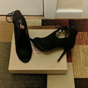 Black suede open toe bootie